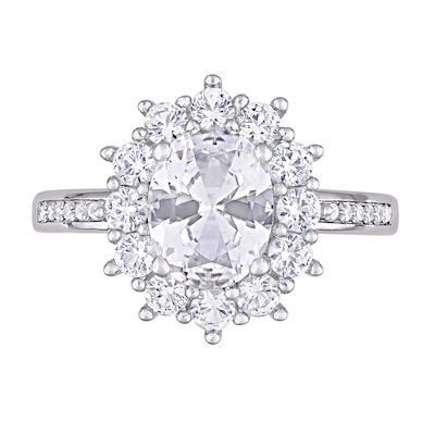 Oval Lab-Created White Sapphire and 0.04 CT. T.W. Diamond Starburst Frame Ring in Sterling Silver