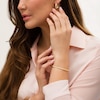 Thumbnail Image 1 of Diamond-Cut Flex Bangle and Hoop Earrings Set in 10K Gold - 7.5"