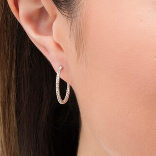 0.25 CT. T.W. Diamond Inside-Out Hoop Earrings in Sterling Silver