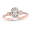Thumbnail Image 0 of 0.145 CT. T.W. Composite Diamond Oval Frame Heart-Sides Promise Ring in 10K Rose Gold