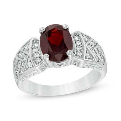 Oval Garnet and Lab-Created White Sapphire Celtic Pattern Ring in Sterling Silver