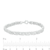 0.23 CT. T.W. Diamond Floral "XO" Link Bracelet in Sterling Silver - 7.25"