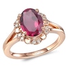 Le Vian® Oval Raspberry Rhodolite™ and Crème Brûlée Diamonds™ 0.11 CT. T.W. Diamond Frame Ring in 14K Strawberry Gold™