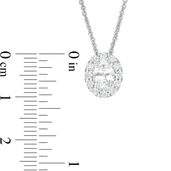 CT. T.W. Certified Oval Diamond Frame Pendant in 14K White Gold (I/SI2