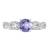 6.0mm Tanzanite and 0.08 CT. T.W. Diamond Twist Shank Ring in 10K White Gold