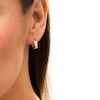 Thumbnail Image 1 of Baguette Cubic Zirconia Huggie Hoop Earrings in 14K Gold