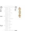 Thumbnail Image 2 of Cubic Zirconia Three Stone Twisted Loose Braid Huggie Hoop Earrings in 14K Gold