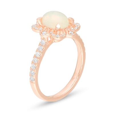 Oval Opal and 0.33 CT. T.W. Diamond Flower Frame Ring in 10K Rose Gold