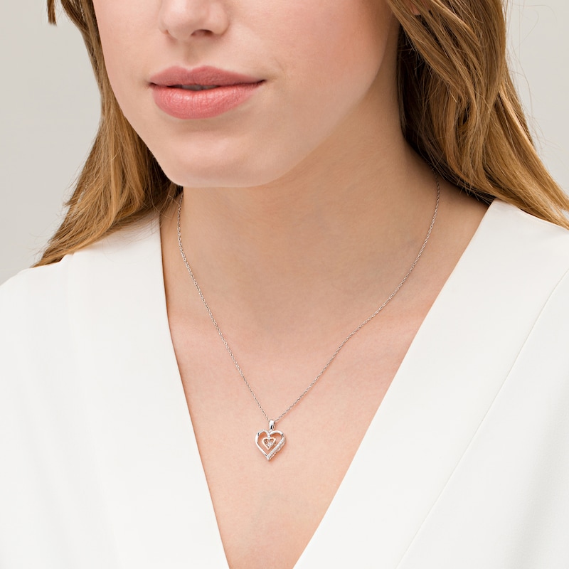 Unstoppable Love™ 0.065 CT. T.W. Diamond Double Heart Pendant in Sterling Silver and 10K Rose Gold|Peoples Jewellers