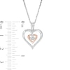 Unstoppable Love™ 0.065 CT. T.W. Diamond Double Heart Pendant in Sterling Silver and 10K Rose Gold