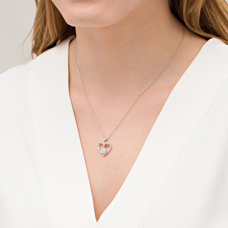 0.085 CT. T.W. Composite Diamond Double Heart Pendant in Sterling Silver