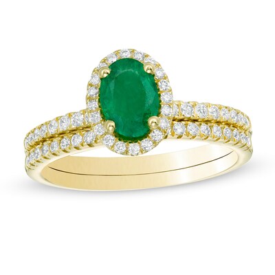 Oval Emerald and 0.33 CT. T.W. Diamond Frame Bridal Set in 14K Gold