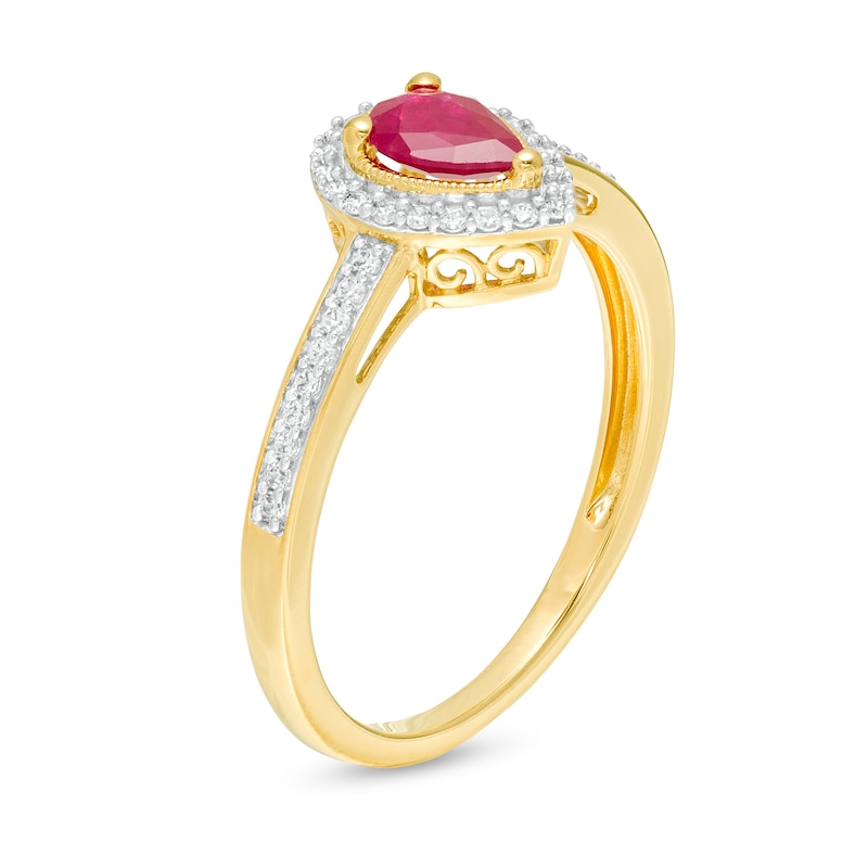 Pear-Shaped Ruby and 0.10 CT. T.W. Diamond Frame Ring in 10K Gold