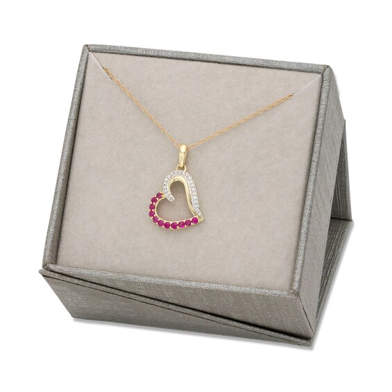 Ruby and 0.065 CT. T.W. Diamond Tilted Heart Pendant in 10K Gold