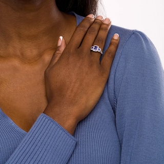 Emerald-Cut Tanzanite and 0.33 CT. T.W. Diamond Frame Three Stone Split Shank Engagement Ring in 14K White Gold