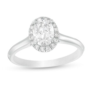 1.11 CT. T.W. Certified Oval Diamond Frame Engagement Ring in 14K White Gold (I/I2)