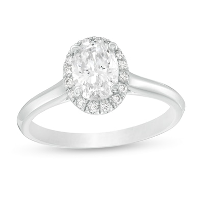 1.11 CT. T.W. Certified Oval Diamond Frame Engagement Ring in 14K White Gold (I/I2)