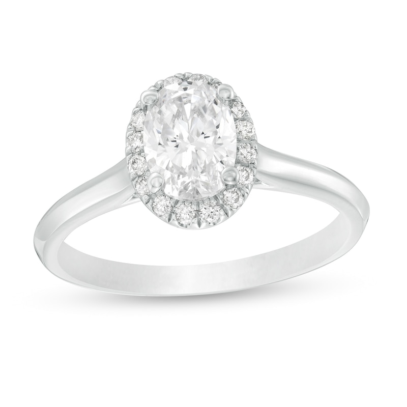 1.11 CT. T.W. Certified Oval Diamond Frame Engagement Ring in 14K White Gold (I/I2)|Peoples Jewellers