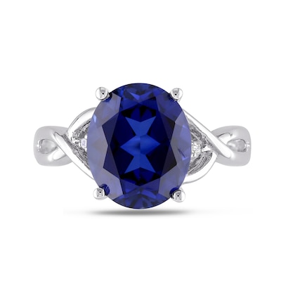 Oval Lab-Created Blue Sapphire and Diamond Accent Criss-Cross Split Shank Ring in Sterling Silver