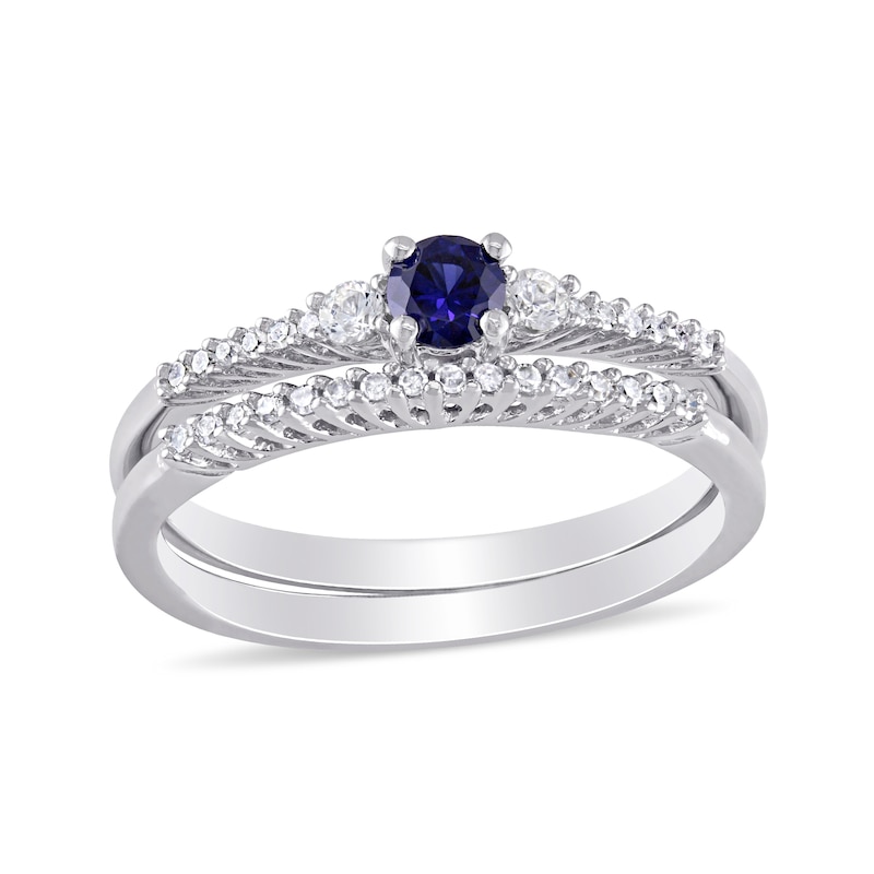Lab-Created Blue and White Sapphire and 0.11 CT. T.W. Diamond Three Stone Bridal Set in Sterling Silver