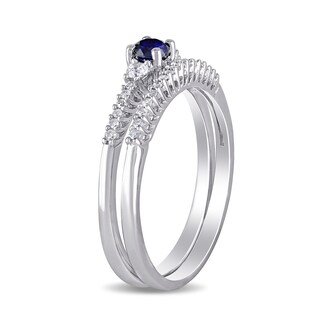 Lab-Created Blue and White Sapphire and 0.11 CT. T.W. Diamond Three Stone Bridal Set in Sterling Silver