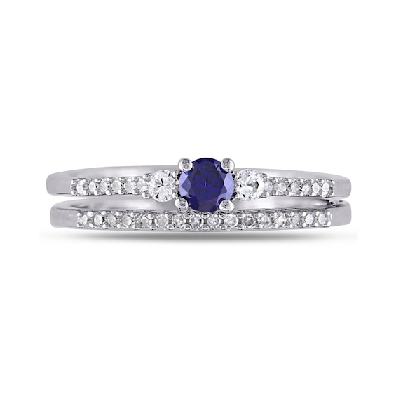 Lab-Created Blue and White Sapphire and 0.11 CT. T.W. Diamond Three Stone Bridal Set in Sterling Silver