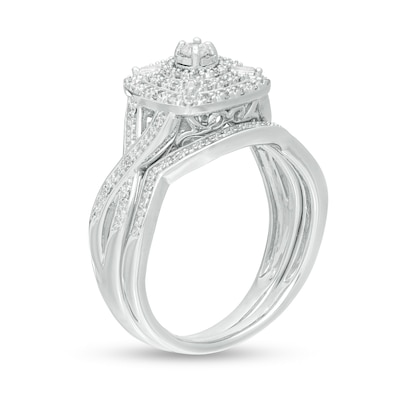 0.24 CT. T.W. Diamond Cushion and Round Triple Frame Twist Shank Bridal Set in Sterling Silver