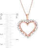 0.23 CT. T.W. Diamond Sunburst Heart Pendant in 10K Rose Gold