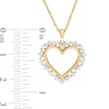 Thumbnail Image 2 of 0.23 CT. T.W. Diamond Sunburst Heart Pendant in 10K Gold