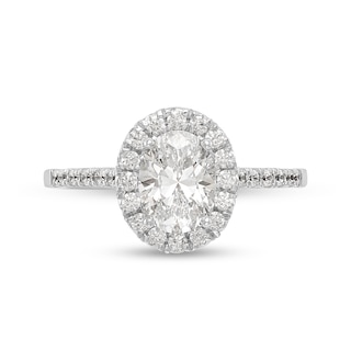 1.08 CT. T.W. Oval Diamond Frame Engagement Ring in Platinum