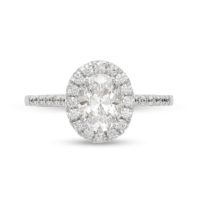 1.08 CT. T.W. Oval Diamond Frame Engagement Ring in Platinum