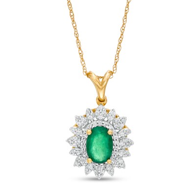 Oval Emerald and 0.20 CT. T.W. Diamond Flower Frame Pendant in 10K Gold