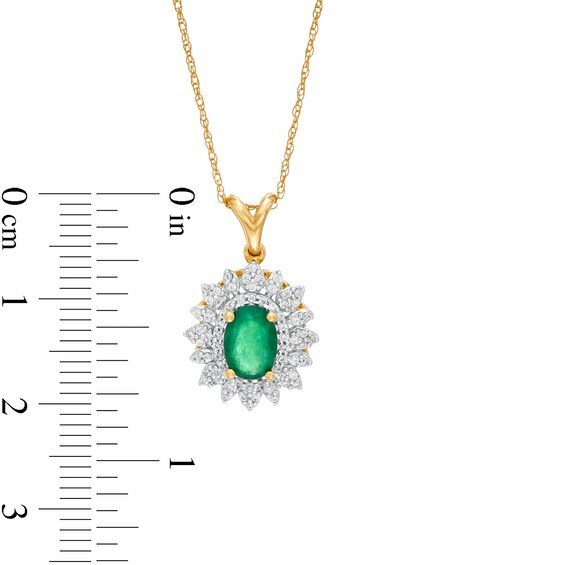 Oval Emerald and 0.20 CT. T.W. Diamond Flower Frame Pendant in 10K Gold