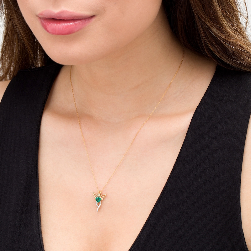 5.0mm Heart-Shaped Lab-Created Emerald and 0.04 CT. T.W. Diamond Angel Pendant in 10K Gold|Peoples Jewellers