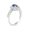 Thumbnail Image 1 of Oval Blue Sapphire and 0.10 CT. T.W. Diamond Sunburst Frame Vintage-Style Tapered Shank Ring in 10K White gold