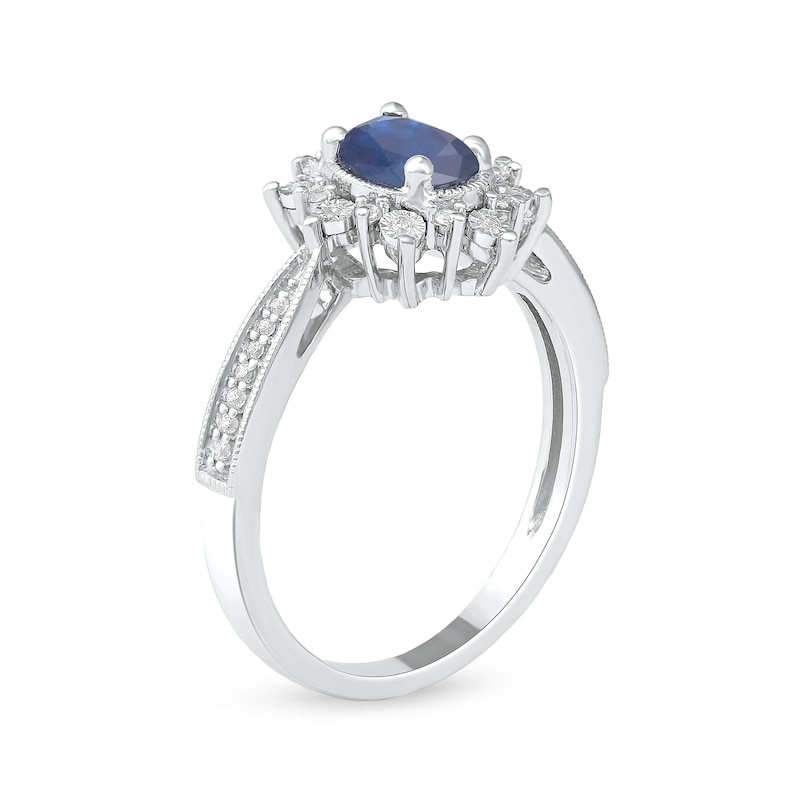 Oval Blue Sapphire and 0.10 CT. T.W. Diamond Sunburst Frame Vintage-Style Tapered Shank Ring in 10K White gold|Peoples Jewellers