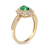 Thumbnail Image 1 of Oval Emerald and 0.10 CT. T.W. Diamond Sunburst Frame Vintage-Style Tapered Shank Ring in 10K Gold