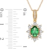 Thumbnail Image 3 of Oval Emerald and 0.08 CT. T.W. Diamond Sunburst Frame Vintage-Style Drop Pendant in 10K Gold