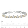 0.20 CT. T.W. Diamond Tilted Square "X" Link Bracelet in Sterling Silver and 10K Gold - 7.25"