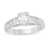 1.20 CT. T.W. Oval and Princess-Cut Diamond Engagement Ring in 14K White Gold