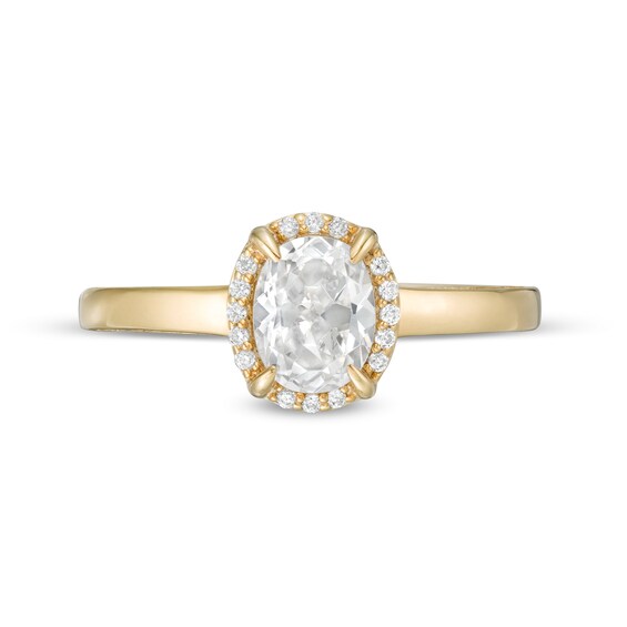 0.95 CT. T.W. Oval Diamond Solitaire Engagement Ring in 14K Gold