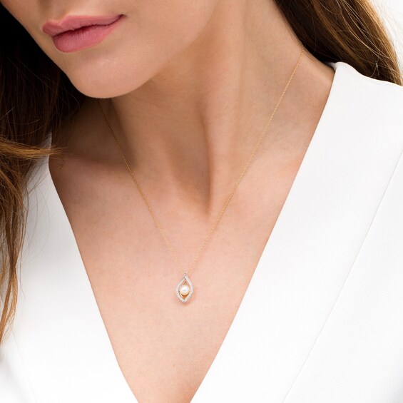 5.0-5.5mm Freshwater Cultured Pearl and White Topaz Double Teardrop Pendant in 10K Gold