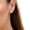 Thumbnail Image 1 of Wonder Woman™ Collection 0.115 CT. T.W. Diamond Symbol Stud Earrings in 10K Gold