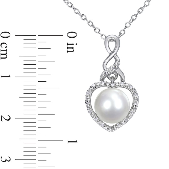 Button Freshwater Cultured Pearl and 0.07 CT. T.W. Diamond Heart Frame Cascading Twist Drop Pendant in Sterling Silver