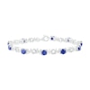 Thumbnail Image 1 of 5.0mm Lab-Created Blue Sapphire and 0.09 CT. T.W. Diamond "MOM" Looping Ribbon Bracelet in Sterling Silver - 7.5"