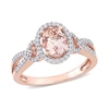 Thumbnail Image 0 of Oval Morganite and 0.19 CT. T.W. Diamond Frame Pointed Split Shank Buckle Ring in 14K Rose Gold