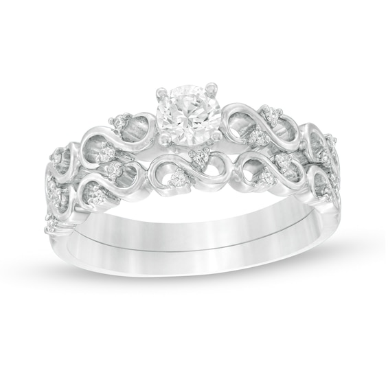 0.23 CT. T.W. Diamond Infinity Bridal Set in 10K Gold