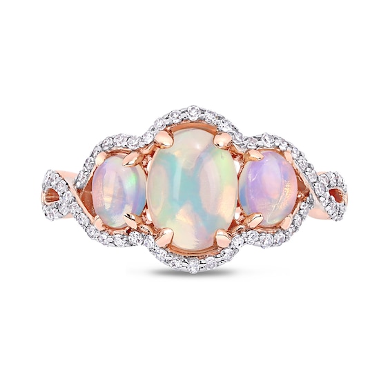 Oval Cabochon Opal and 0.31 CT. T.W. Diamond Frame Three Stone Twist Shank Ring in 10K Rose Gold