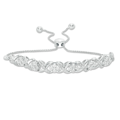 0.09 CT. T.W. Diamond Cascading Infinity with Flowers Bolo Bracelet in Sterling Silver - 9.5"