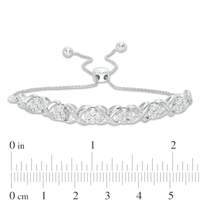 0.09 CT. T.W. Diamond Cascading Infinity with Flowers Bolo Bracelet in Sterling Silver - 9.5"